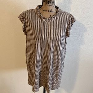 Sleeveless tan and black top